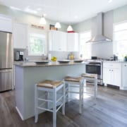 Remodeled kitchen with white cabinetry
