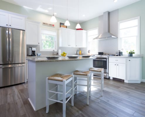 Remodeled kitchen with white cabinetry