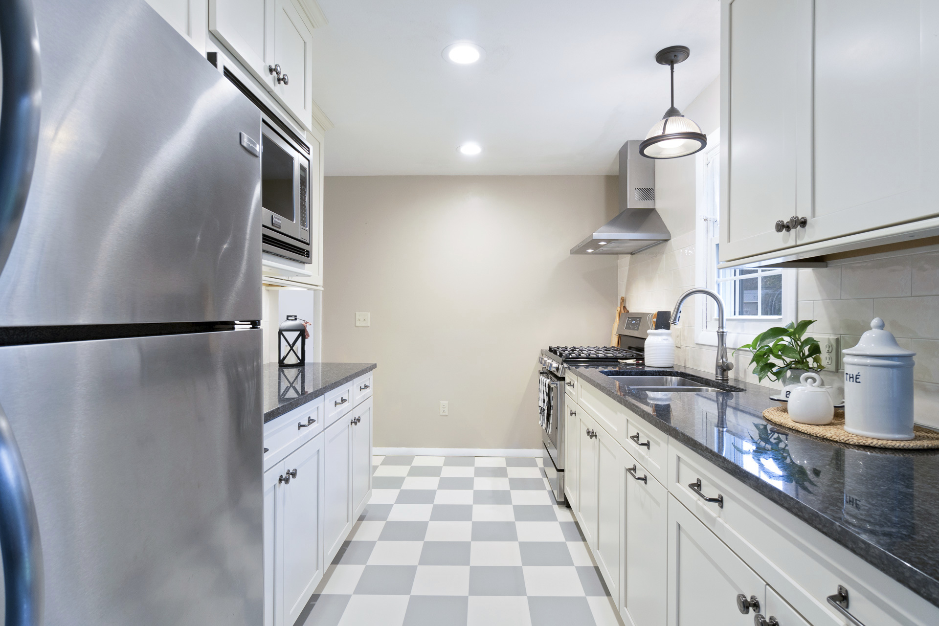 Galley-Kitchen-Remodel-Waypoint-Cabinets-GE-Appliances