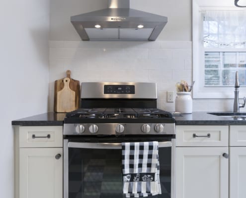 Galley-Kitchen-Remodel-Waypoint-Cabinets-GE-Stove